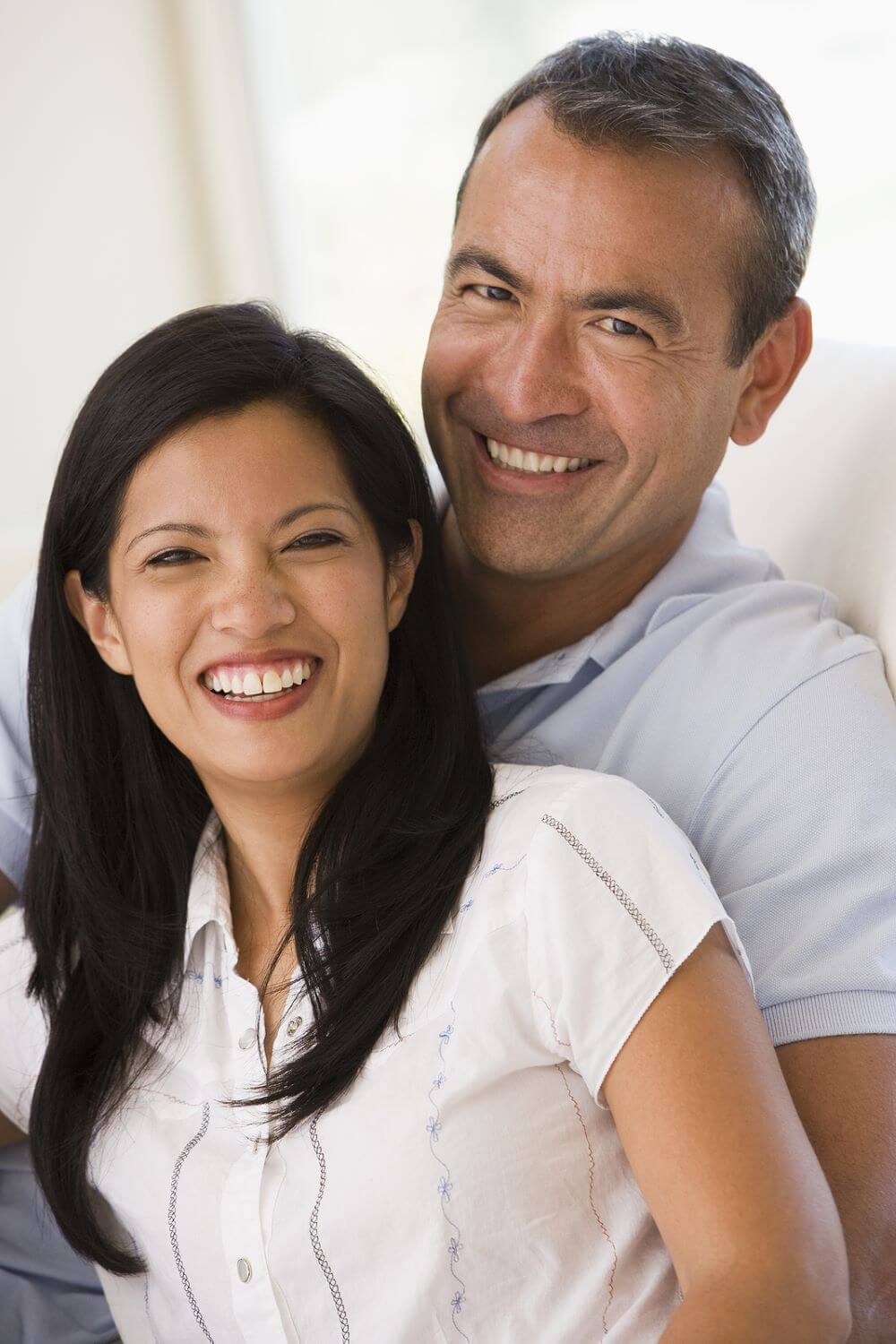 Middle aged couple smiling together. When you’re ready to begin healing and moving forward, contact an eft therapist. Dr. Carol offers marriage counseling and couples therapy in Torrance, CA for those who need support. Call now and begin EFT therapy!